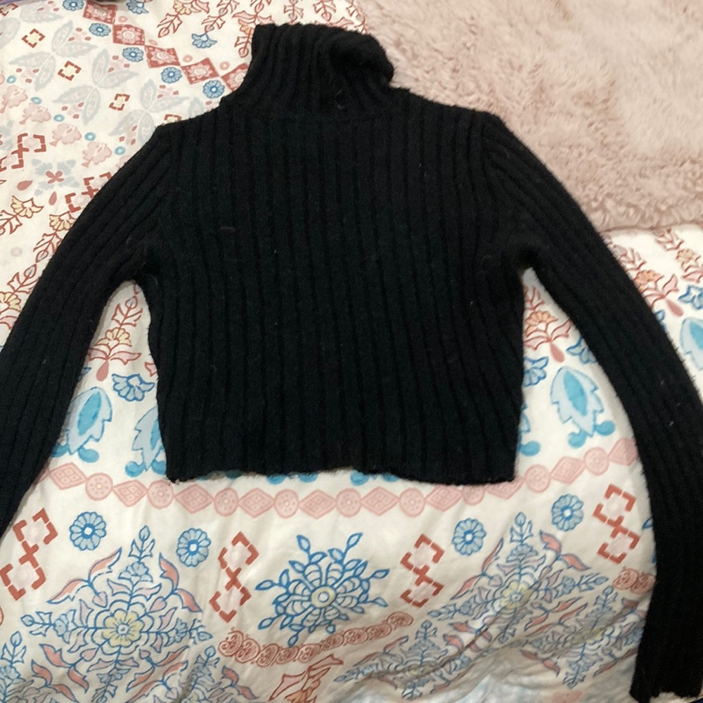 Black turtle neck sweater